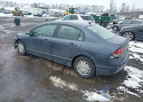 2009 Honda Civic Hybrid from USA, damaged, VIN JHMFA362X9S010374